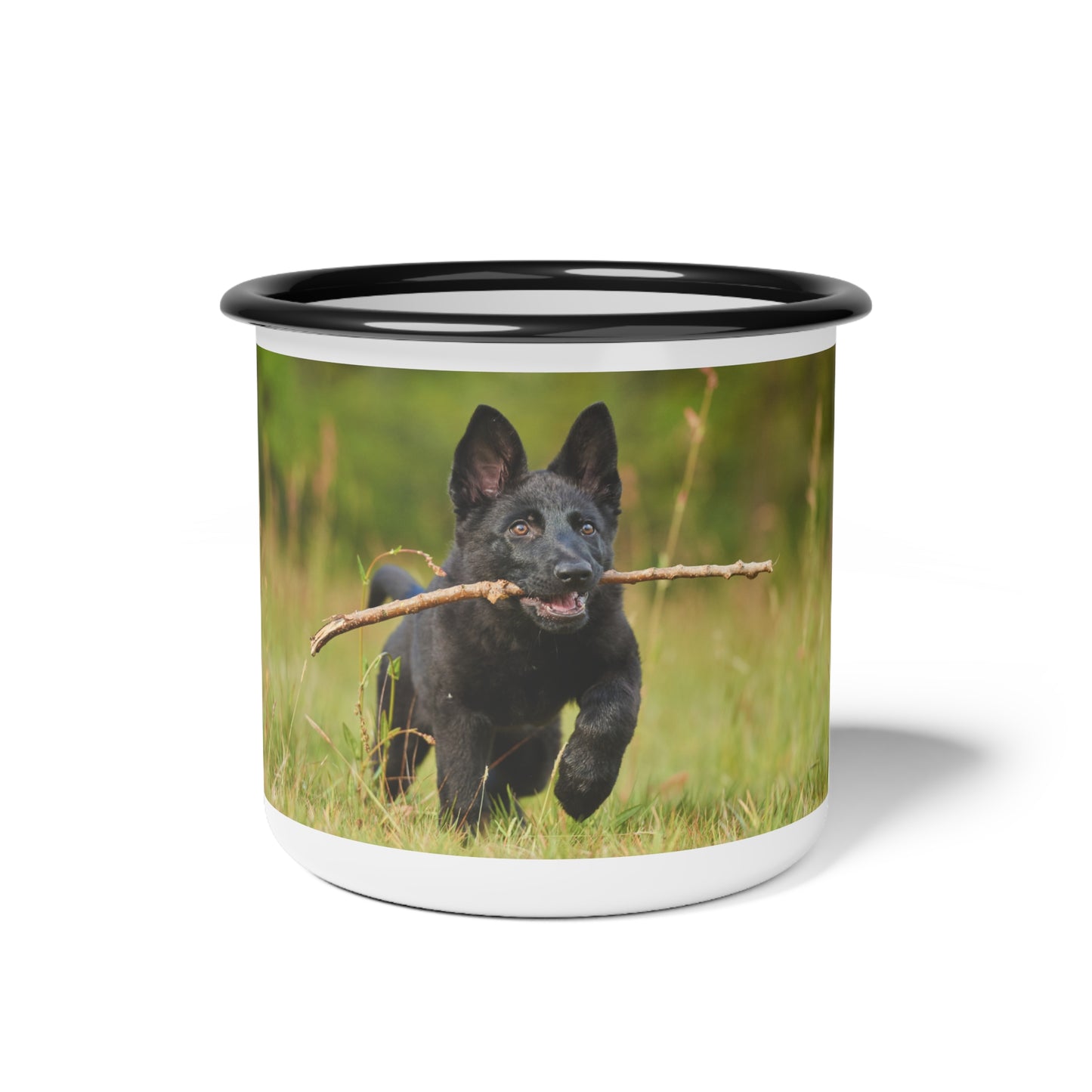Nature-Inspired Enamel Camp Cup – Black German Shepherd Puppy Holding a Wood Piece In Mouth Running on the Grass