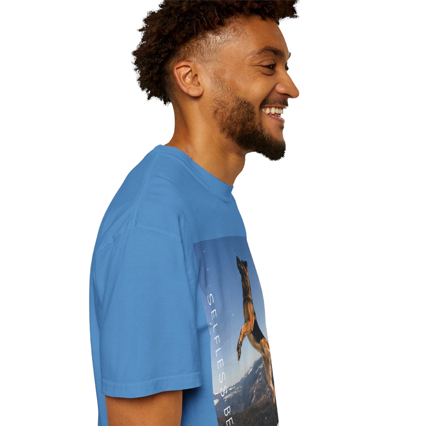 Unisex Dog Lover T-Shirt With a German Shepherd in the Air on Top of Snow Mountain and Caption Selfless Beings