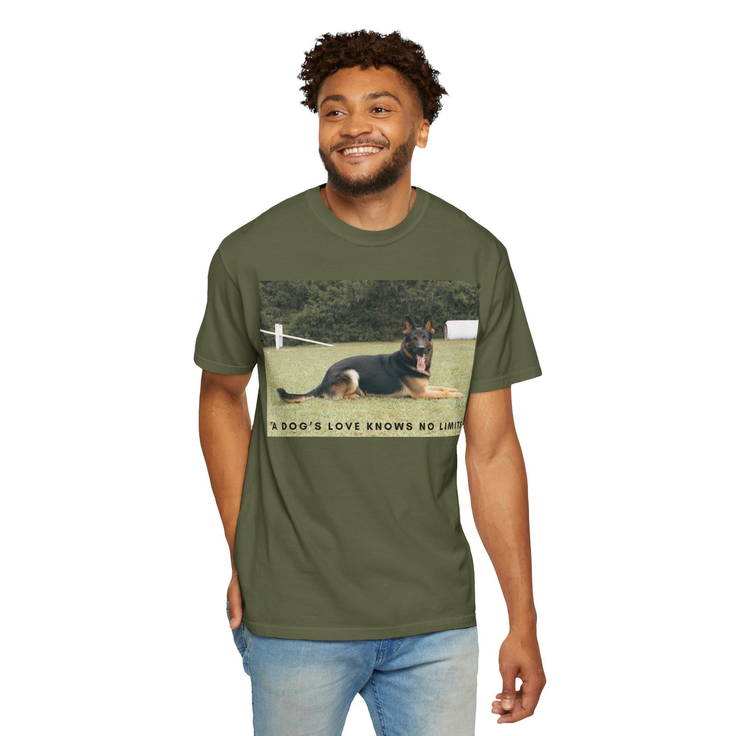 Unisex Dog Lover T-Shirt With a Giant German Shepherd Resting On the Grass Leaving Tongue Out and Text A Dog's Love Knows