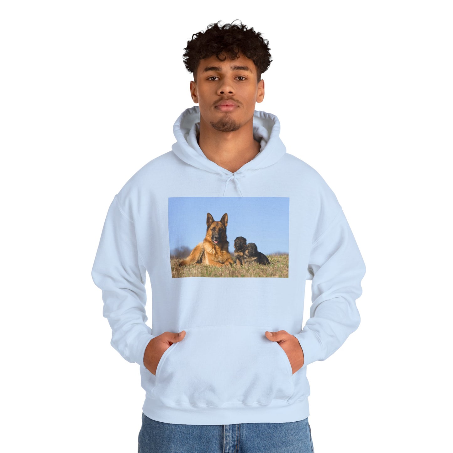 A Unisex Dog Lover Hoodie With a German Shepherd Lying on the Grass With Two Puppies