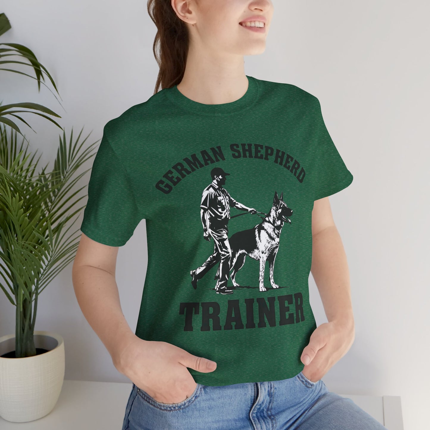 German Shepherd Trainer Tee - Black and White Design of Man Holding a German Shepherd