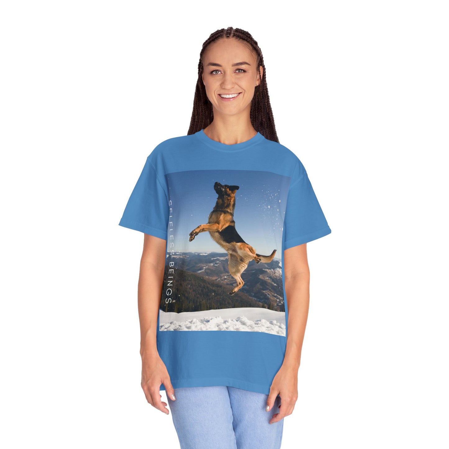 Unisex Dog Lover T-Shirt With a German Shepherd in the Air on Top of Snow Mountain and Caption Selfless Beings