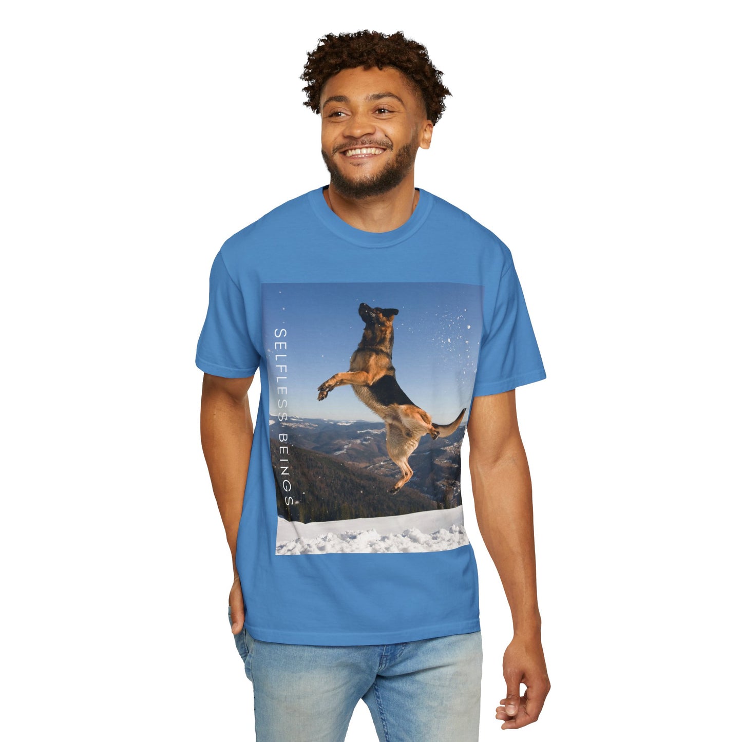 Unisex Dog Lover T-Shirt With a German Shepherd in the Air on Top of Snow Mountain and Caption Selfless Beings