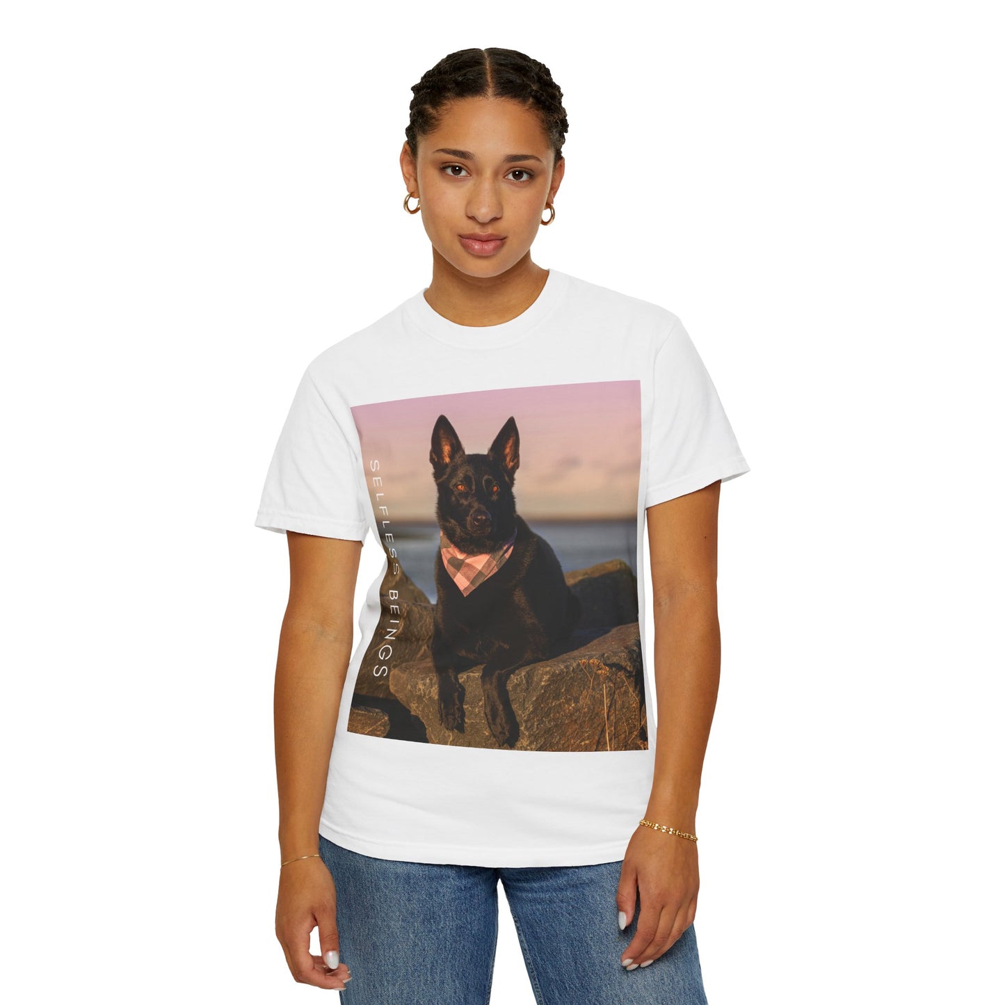Unisex Dog Lover T-shirt With Solid Black German Shepherd Wearing a Romal Sitting on the Seaside Rocks and Caption Selfless Beings