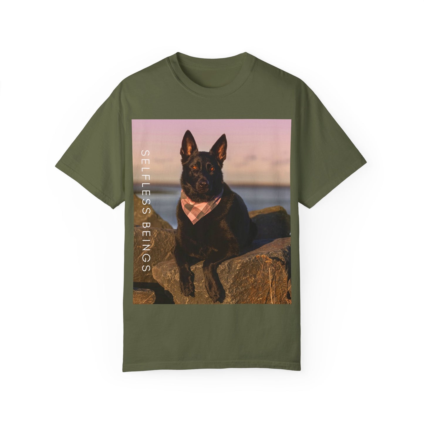 Unisex Dog Lover T-shirt With Solid Black German Shepherd Wearing a Romal Sitting on the Seaside Rocks and Caption Selfless Beings
