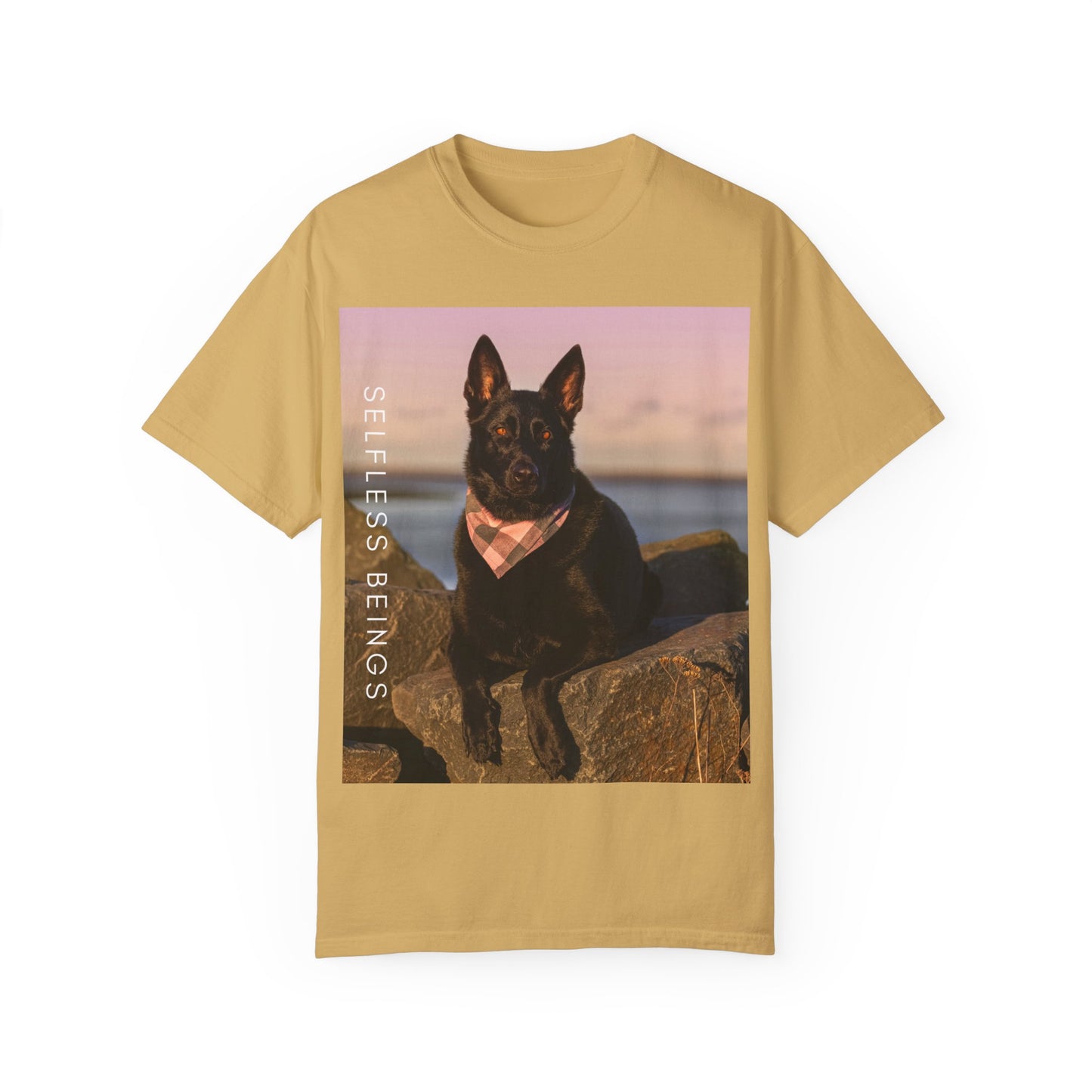 Unisex Dog Lover T-shirt With Solid Black German Shepherd Wearing a Romal Sitting on the Seaside Rocks and Caption Selfless Beings