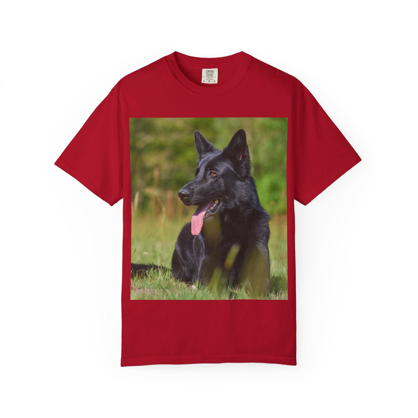 Unisex Garment-Dyed T-Shirt Featuring a Black German Shepherd Resting on Grass Looking Sideways