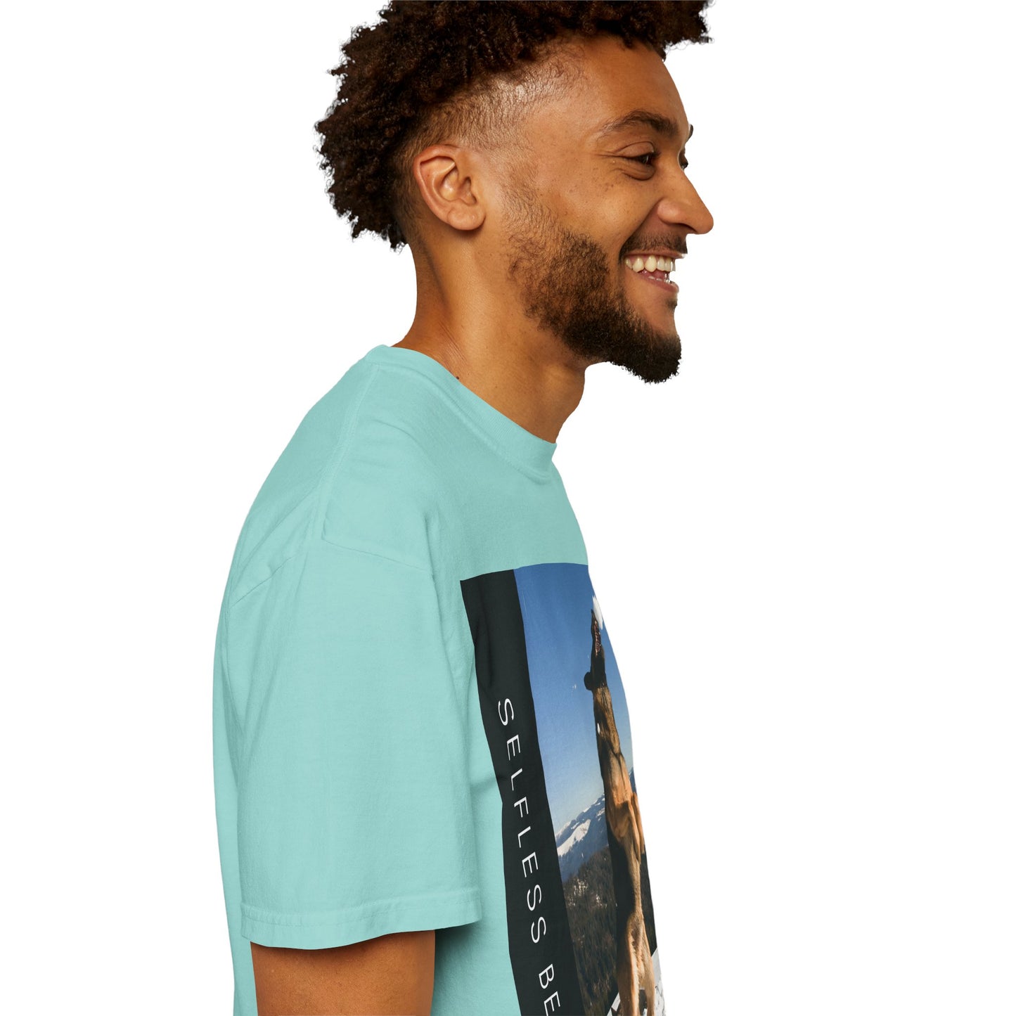 Unisex Dog Lover T-Shirt With a German Shepherd Jumps Upward to Catch a Small Snowball With Mouth and Caption Selfless Beings