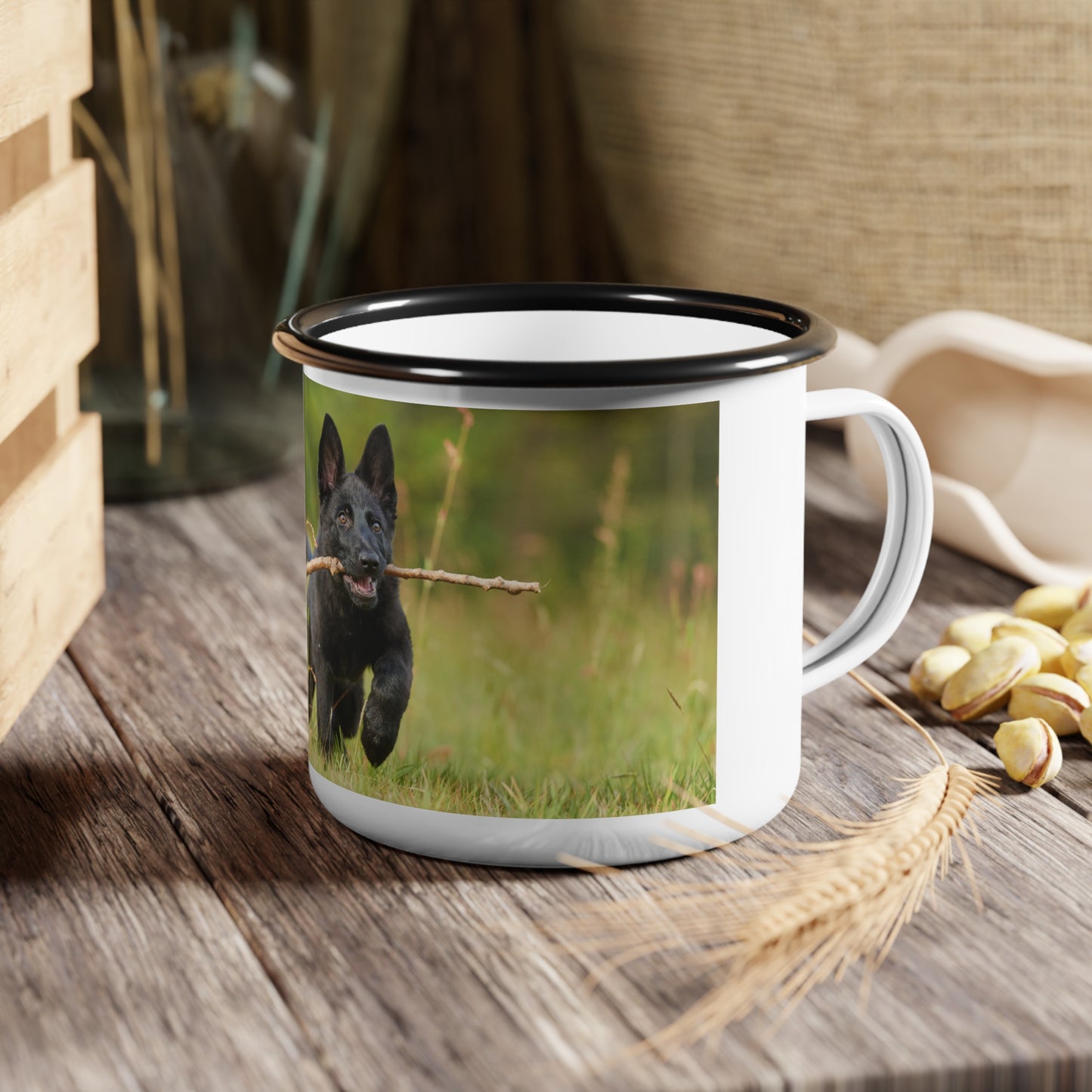 Nature-Inspired Enamel Camp Cup – Black German Shepherd Puppy Holding a Wood Piece In Mouth Running on the Grass