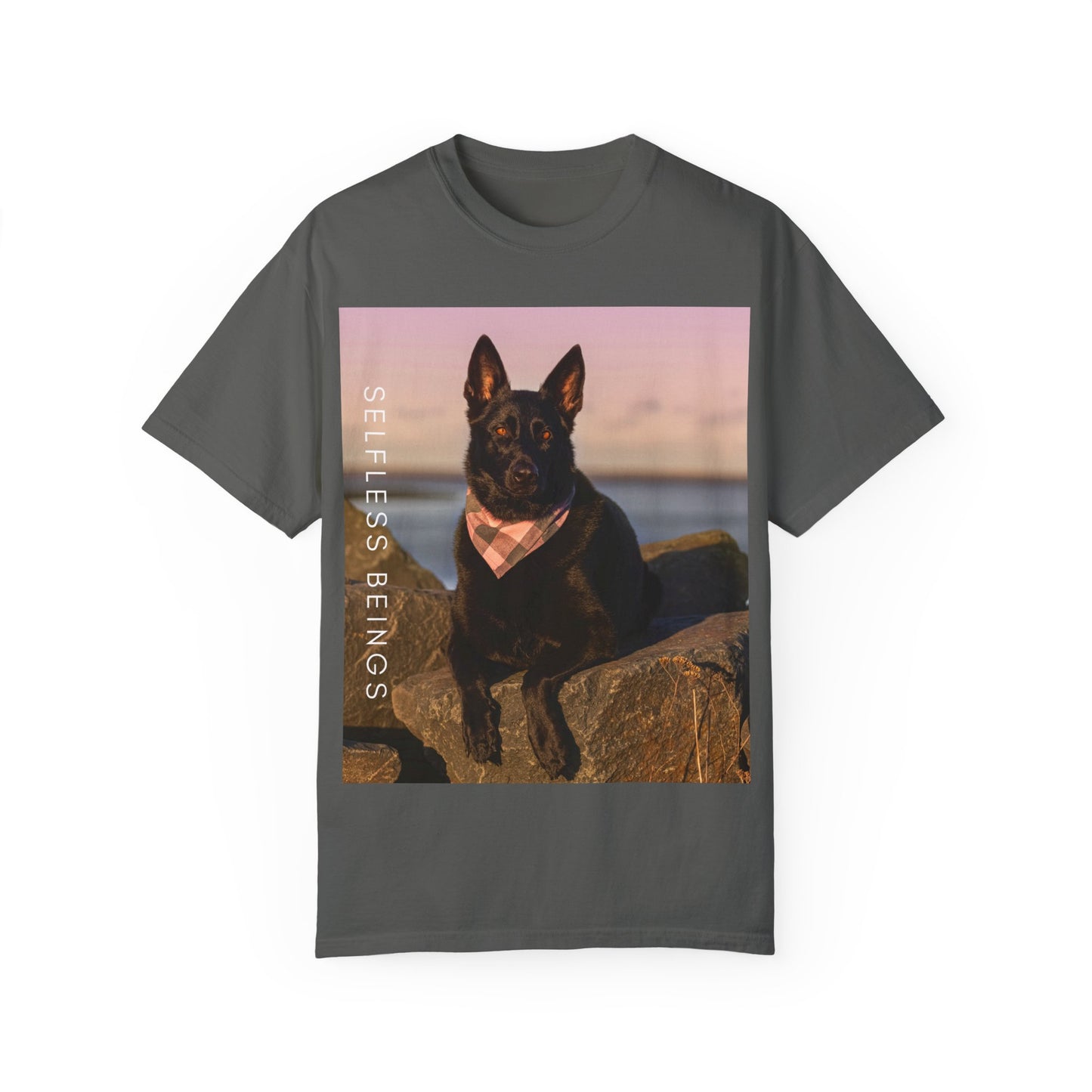 Unisex Dog Lover T-shirt With Solid Black German Shepherd Wearing a Romal Sitting on the Seaside Rocks and Caption Selfless Beings
