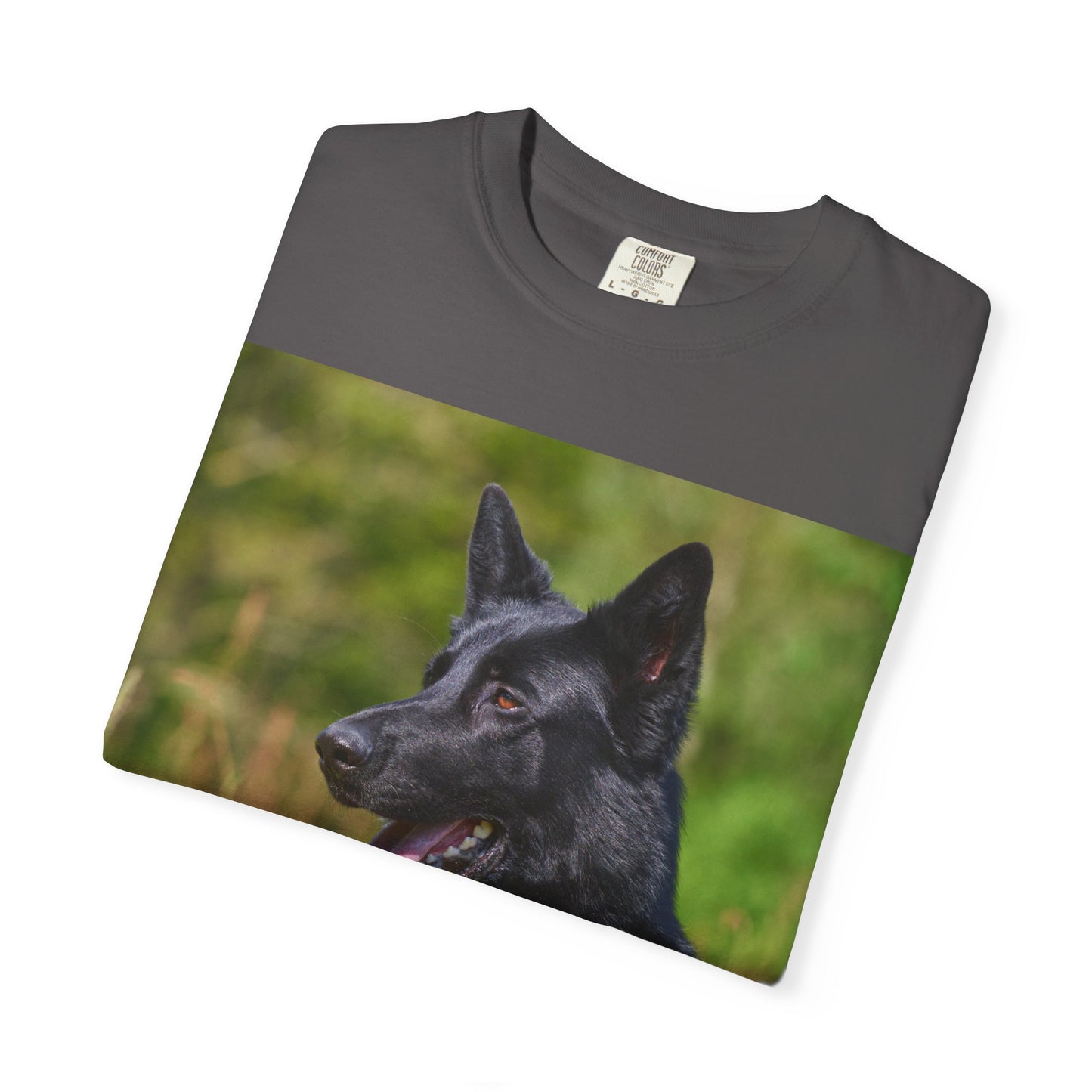 Unisex Garment-Dyed T-Shirt Featuring a Black German Shepherd Resting on Grass Looking Sideways