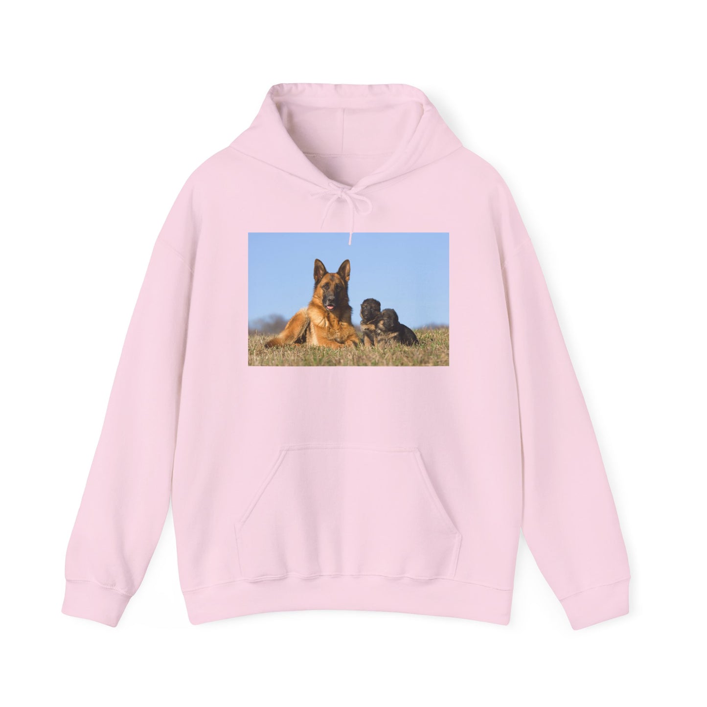 A Unisex Dog Lover Hoodie With a German Shepherd Lying on the Grass With Two Puppies
