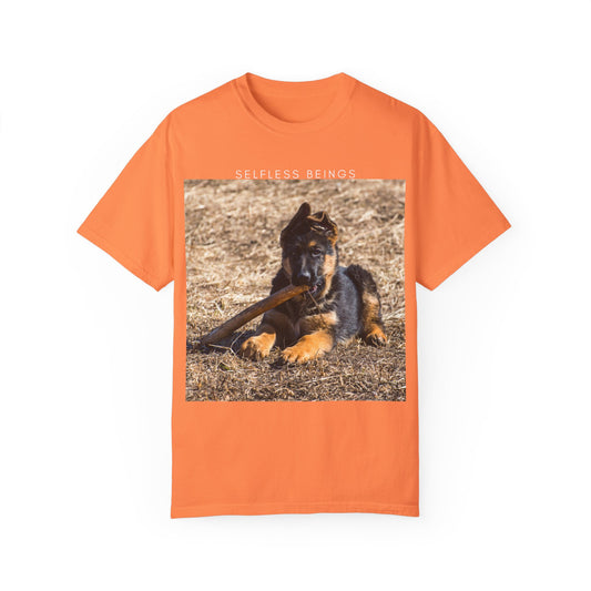 Unisex Dog Lover T-Shirt With a German Shepherd Puppy Playing With Wooden Stick on Dry Grass and Caption Selfless Beings
