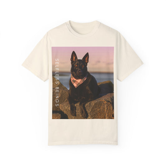 Unisex Dog Lover T-shirt With Solid Black German Shepherd Wearing a Romal Sitting on the Seaside Rocks and Caption Selfless Beings