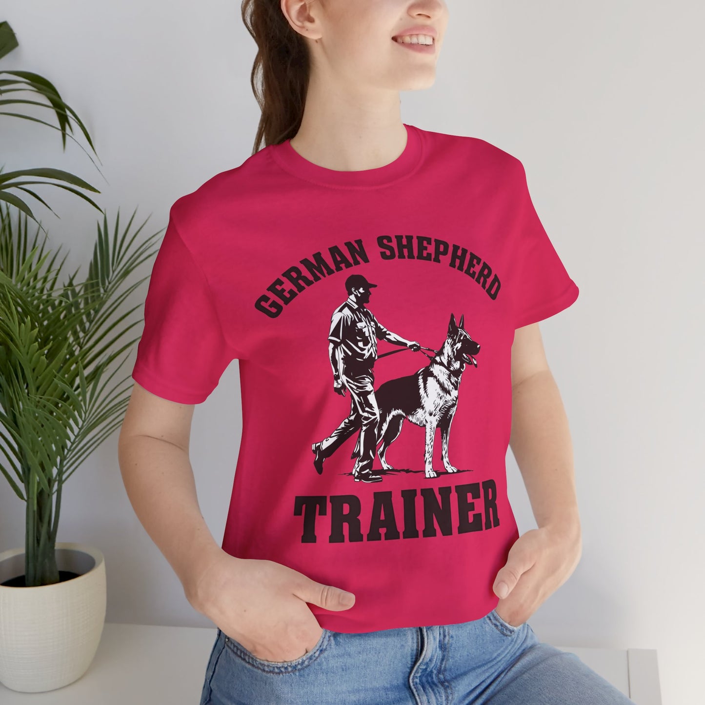 German Shepherd Trainer Tee - Black and White Design of Man Holding a German Shepherd