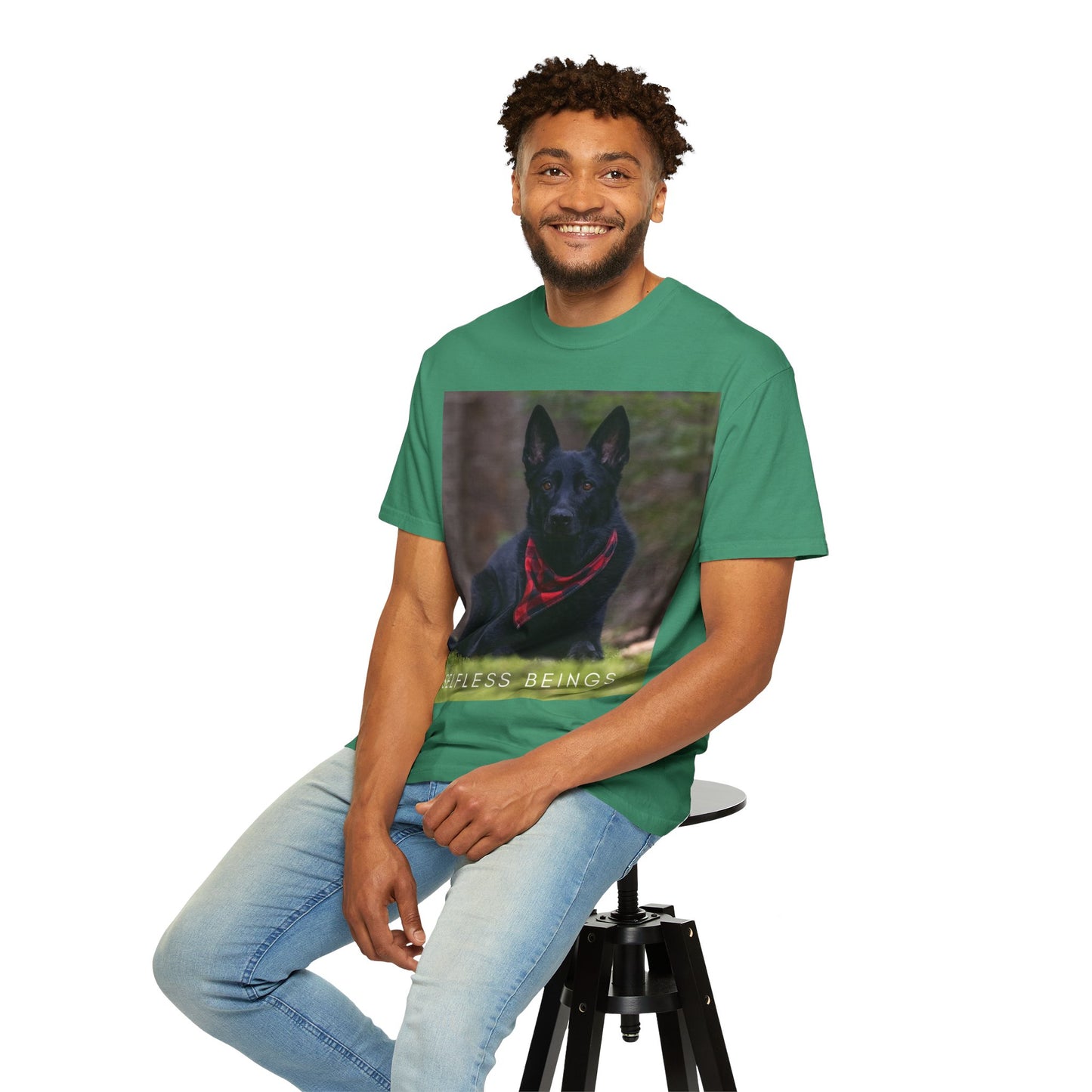 Unisex Dog Lover T-Shirt With a Solid Black German Shepherd Wearing a Red Romal Sitting and Caption Selfless Beings