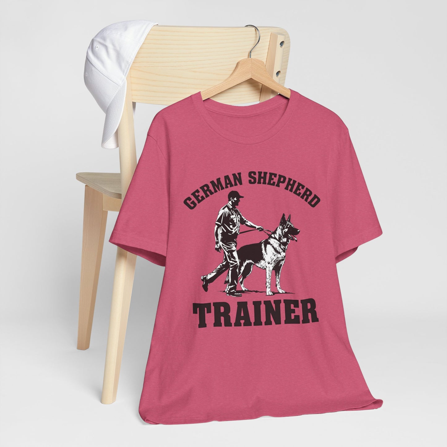 German Shepherd Trainer Tee - Black and White Design of Man Holding a German Shepherd