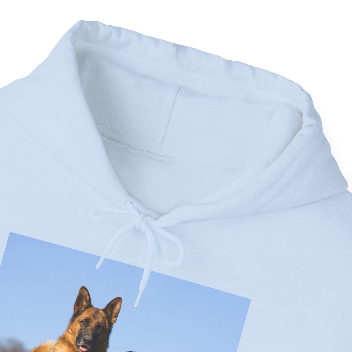 A Unisex Dog Lover Hoodie With a German Shepherd Lying on the Grass With Two Puppies