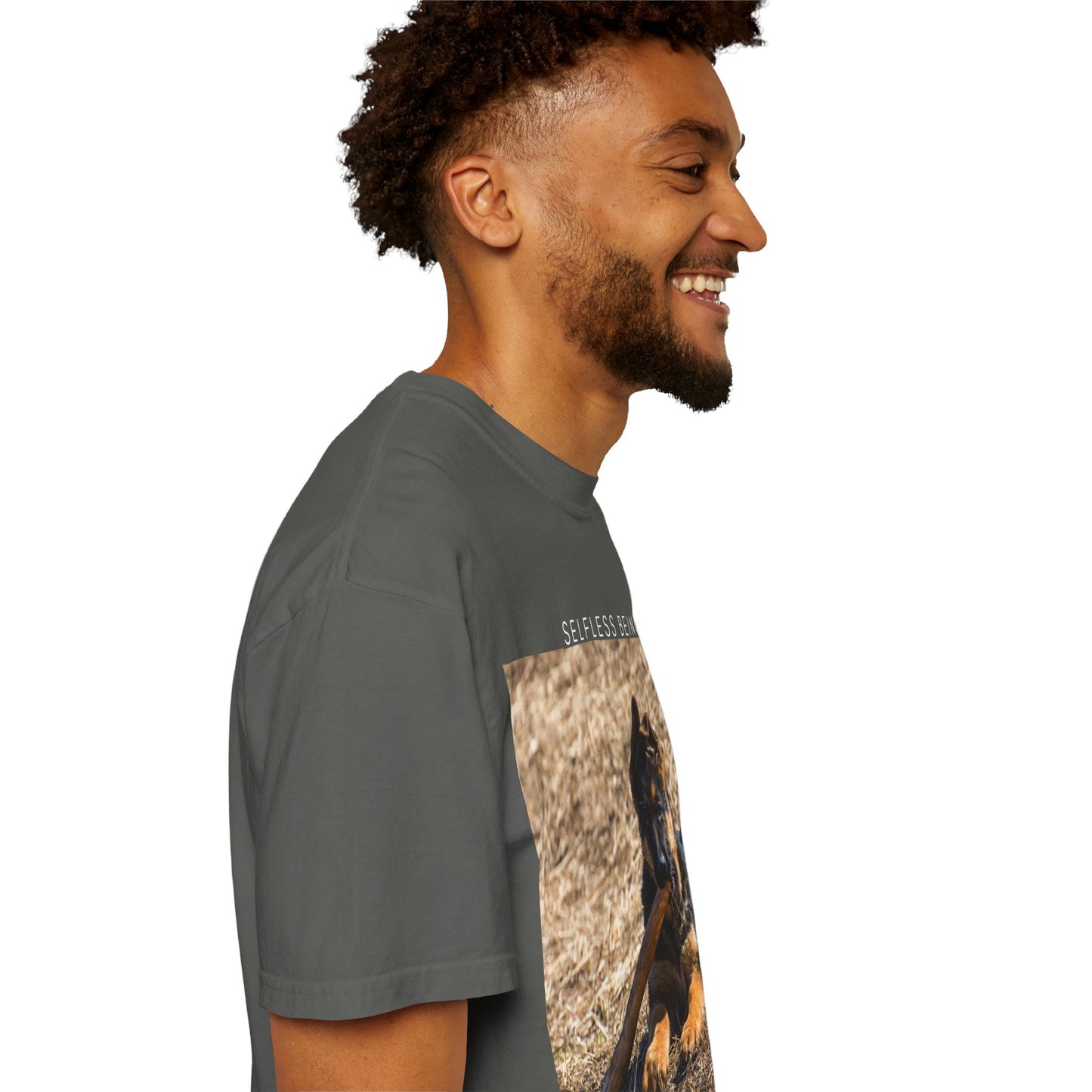 Unisex Dog Lover T-Shirt With a German Shepherd Puppy Playing With Wooden Stick on Dry Grass and Caption Selfless Beings
