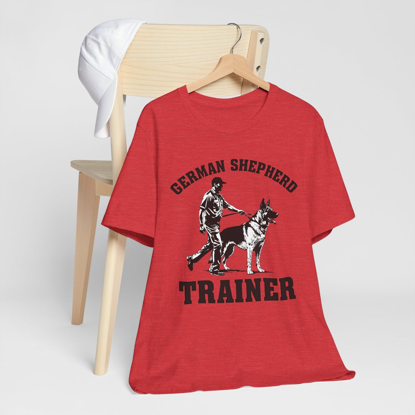 German Shepherd Trainer Tee - Black and White Design of Man Holding a German Shepherd