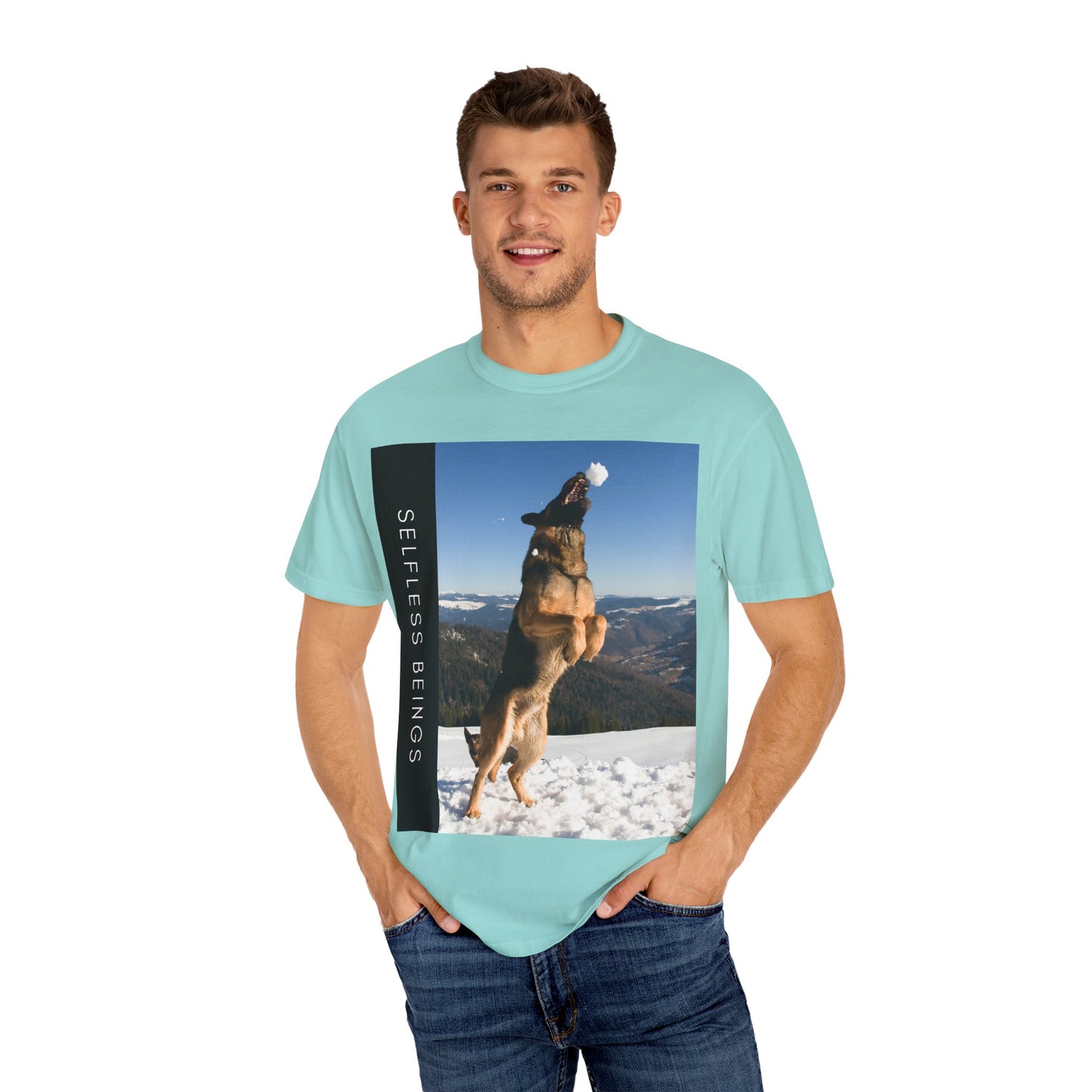 Unisex Dog Lover T-Shirt With a German Shepherd Jumps Upward to Catch a Small Snowball With Mouth and Caption Selfless Beings
