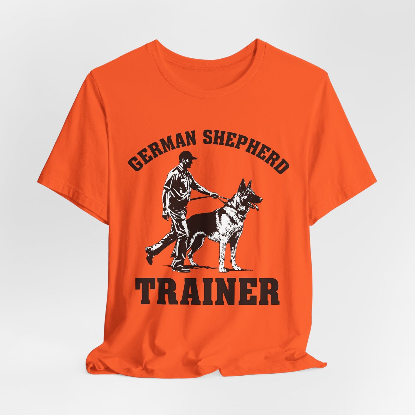 German Shepherd Trainer Tee - Black and White Design of Man Holding a German Shepherd