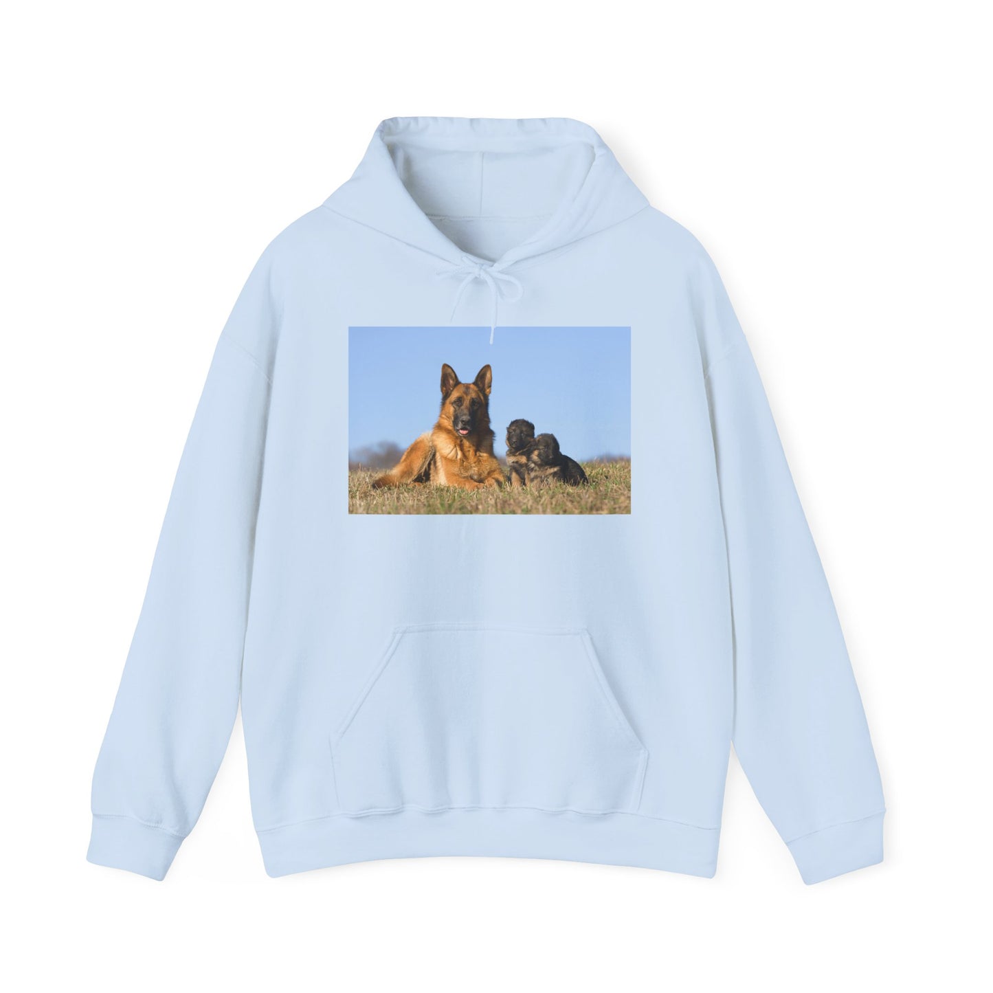 A Unisex Dog Lover Hoodie With a German Shepherd Lying on the Grass With Two Puppies