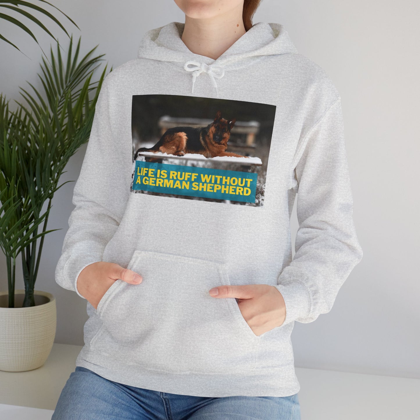 Unisex Dog Lover Hoodie With a German Shepherd Resting On Outdoor Bed In The Snow and Caption Life is Ruff Without GSD