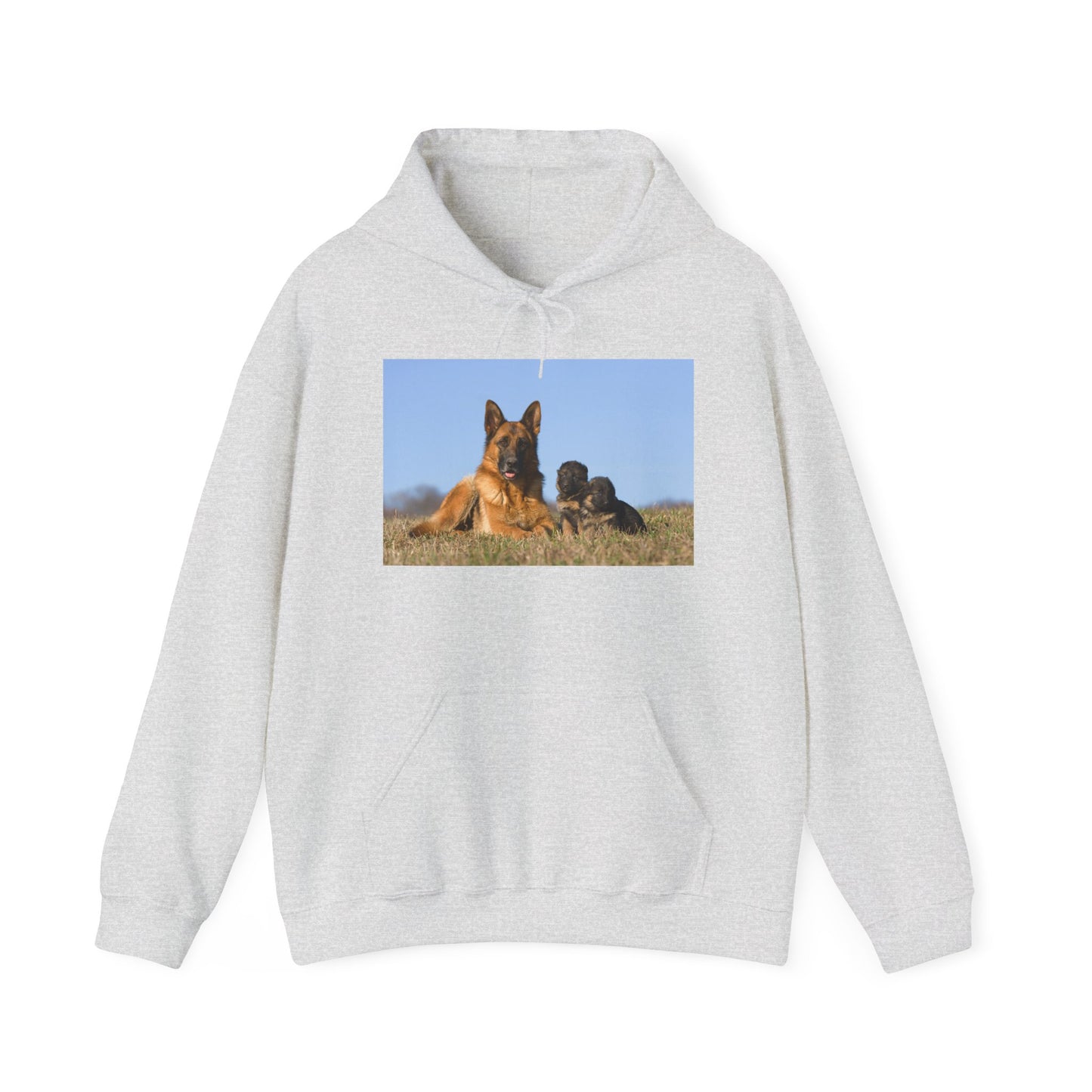 A Unisex Dog Lover Hoodie With a German Shepherd Lying on the Grass With Two Puppies