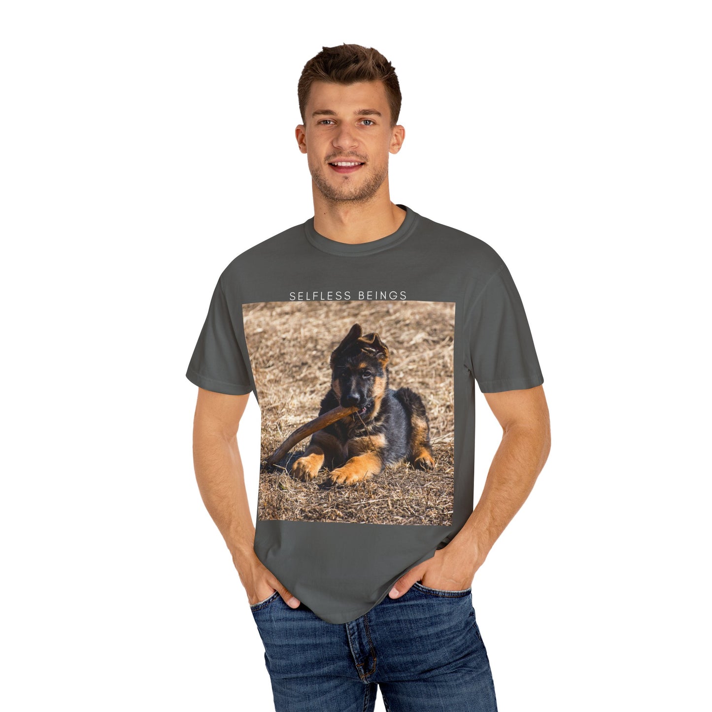 Unisex Dog Lover T-Shirt With a German Shepherd Puppy Playing With Wooden Stick on Dry Grass and Caption Selfless Beings