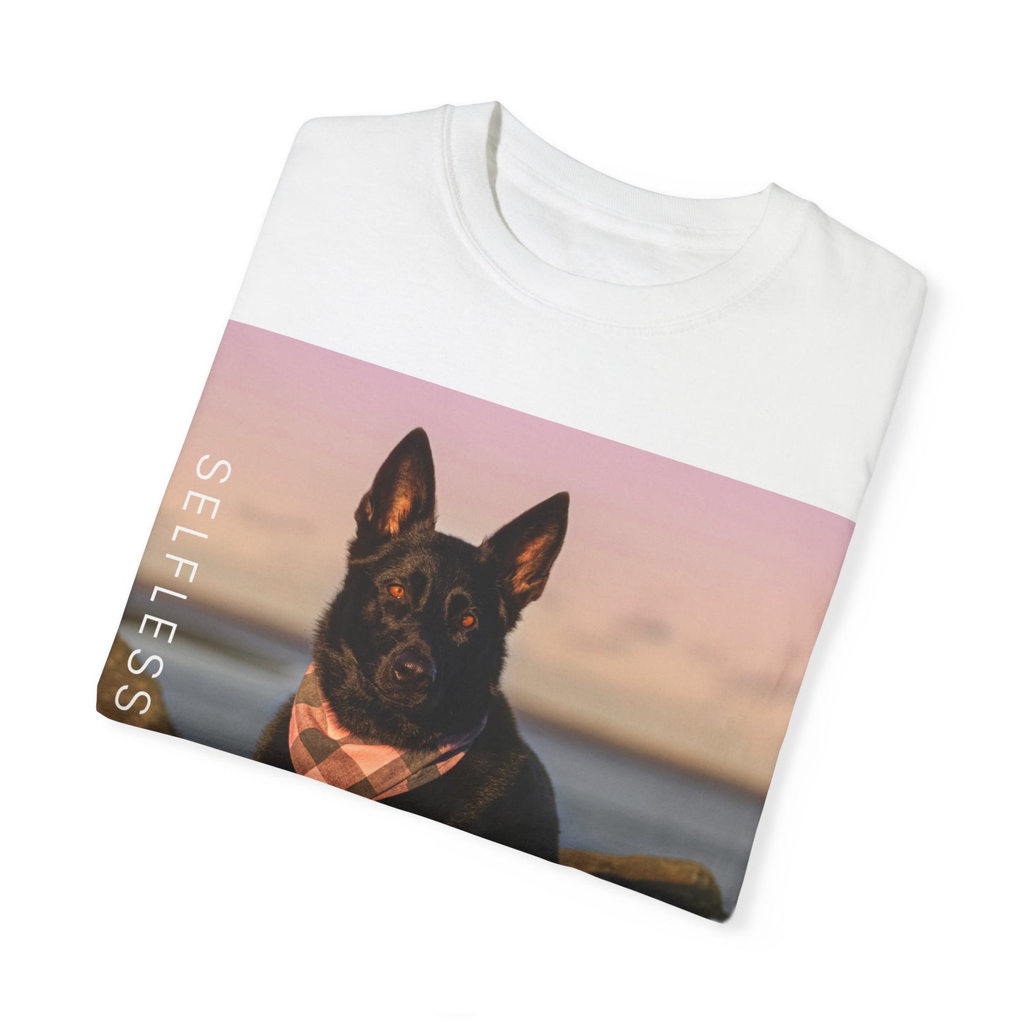 Unisex Dog Lover T-shirt With Solid Black German Shepherd Wearing a Romal Sitting on the Seaside Rocks and Caption Selfless Beings