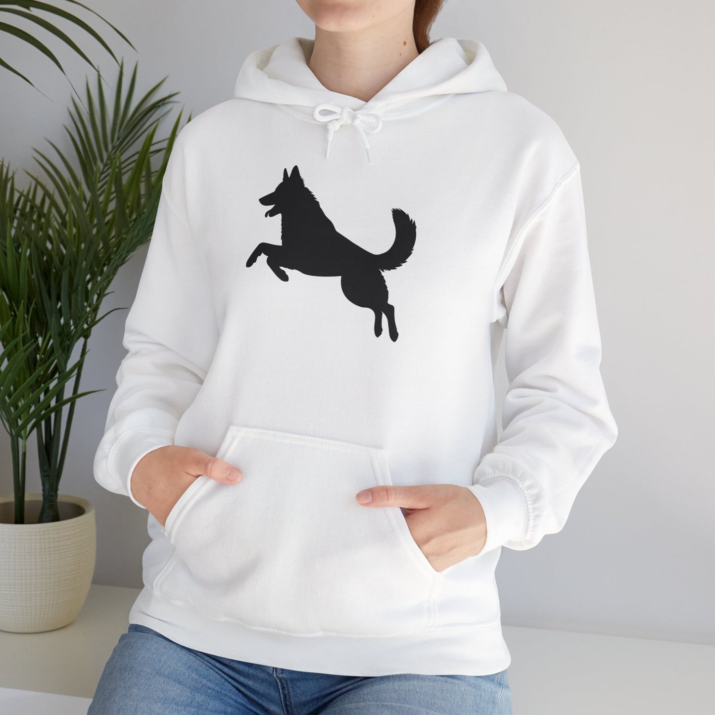Unisex Dog Lover Hoodie With a Graphic of Solid Black German Shepherd Jumping in the Air