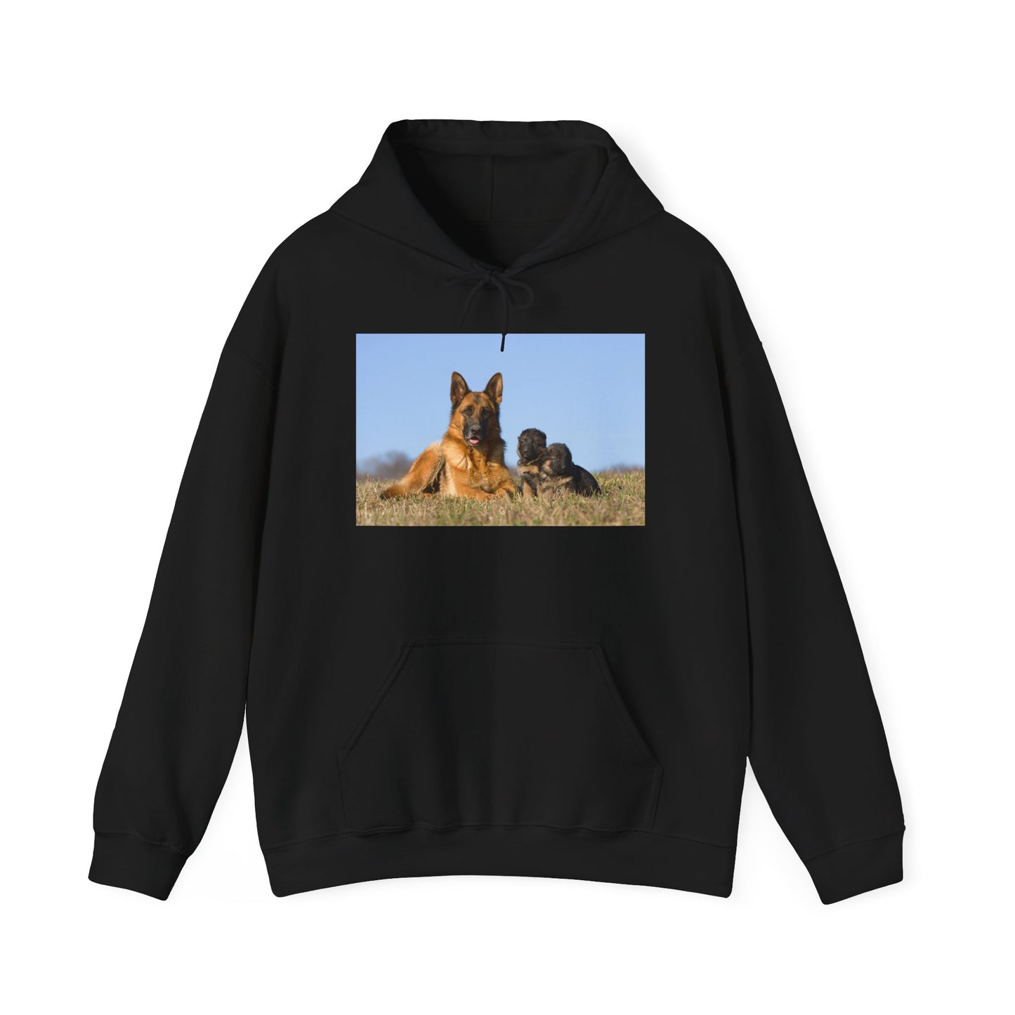 A Unisex Dog Lover Hoodie With a German Shepherd Lying on the Grass With Two Puppies