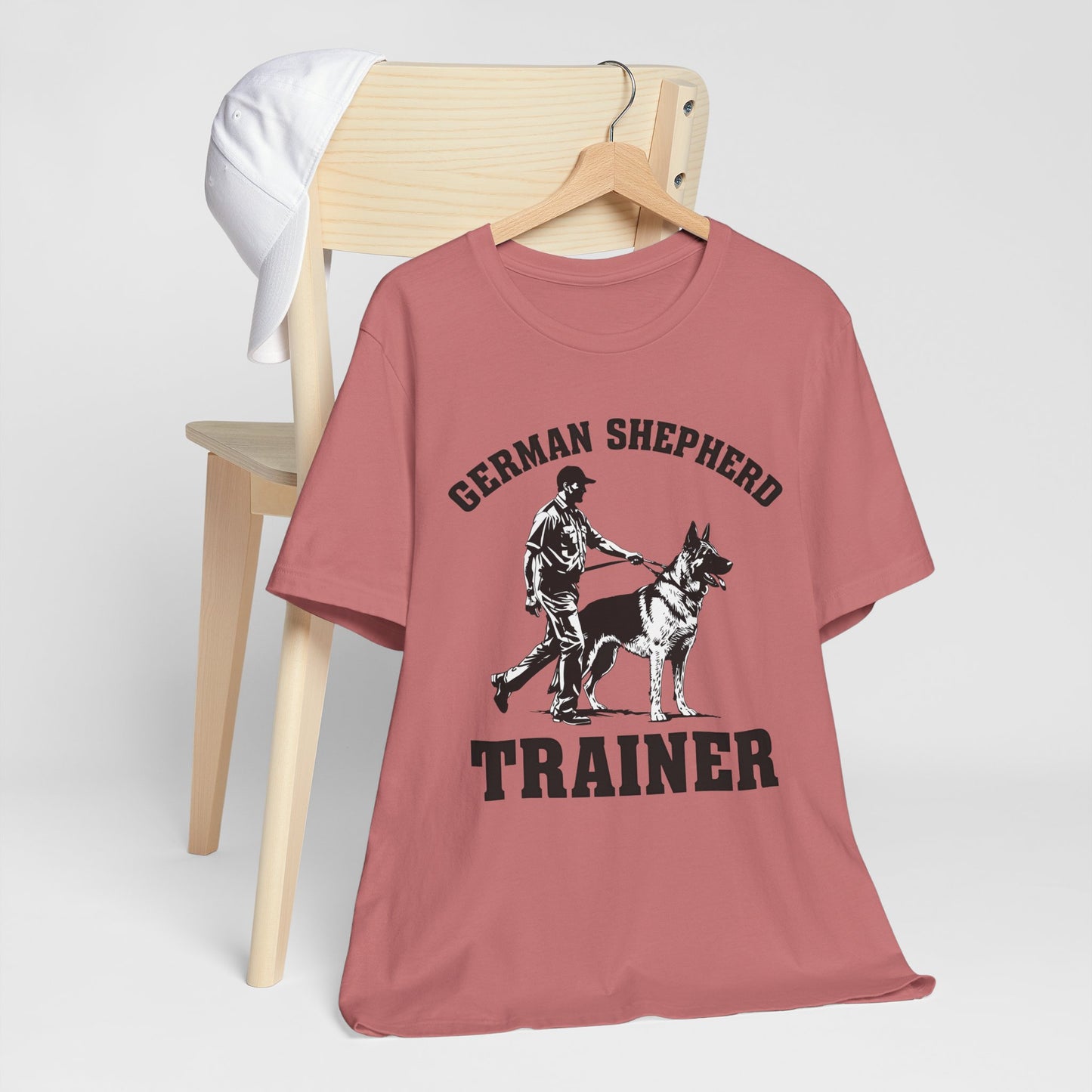 German Shepherd Trainer Tee - Black and White Design of Man Holding a German Shepherd