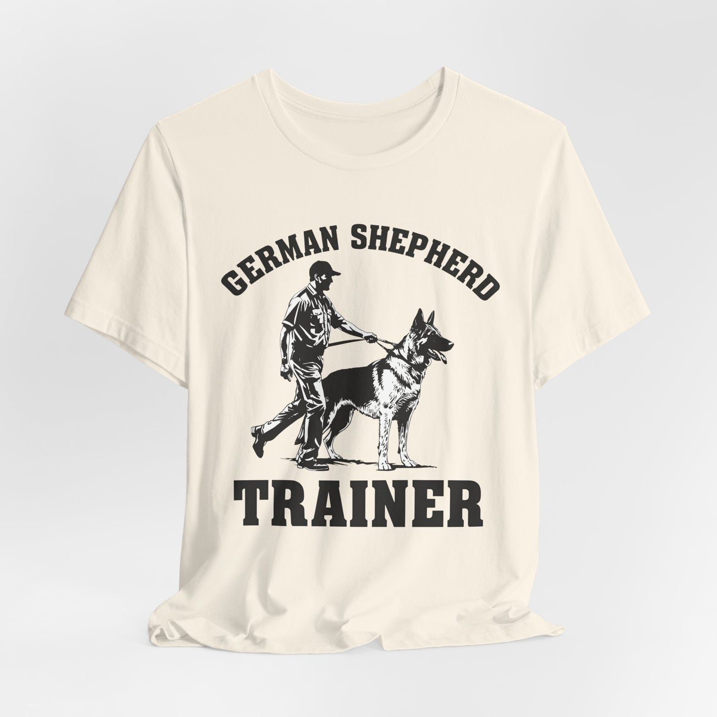 German Shepherd Trainer Tee - Black and White Design of Man Holding a German Shepherd