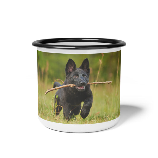 Nature-Inspired Enamel Camp Cup – Black German Shepherd Puppy Holding a Wood Piece In Mouth Running on the Grass