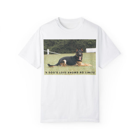 Unisex Dog Lover T-Shirt With a Giant German Shepherd Resting On the Grass Leaving Tongue Out and Text A Dog's Love Knows