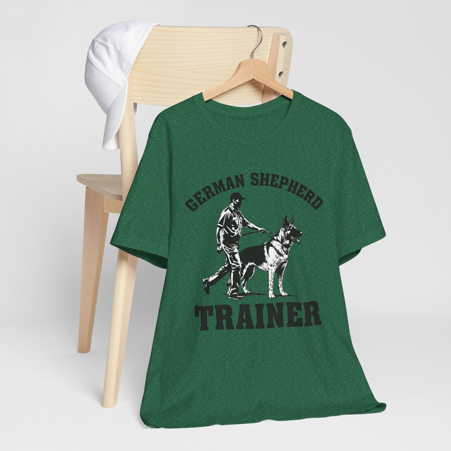 German Shepherd Trainer Tee - Black and White Design of Man Holding a German Shepherd