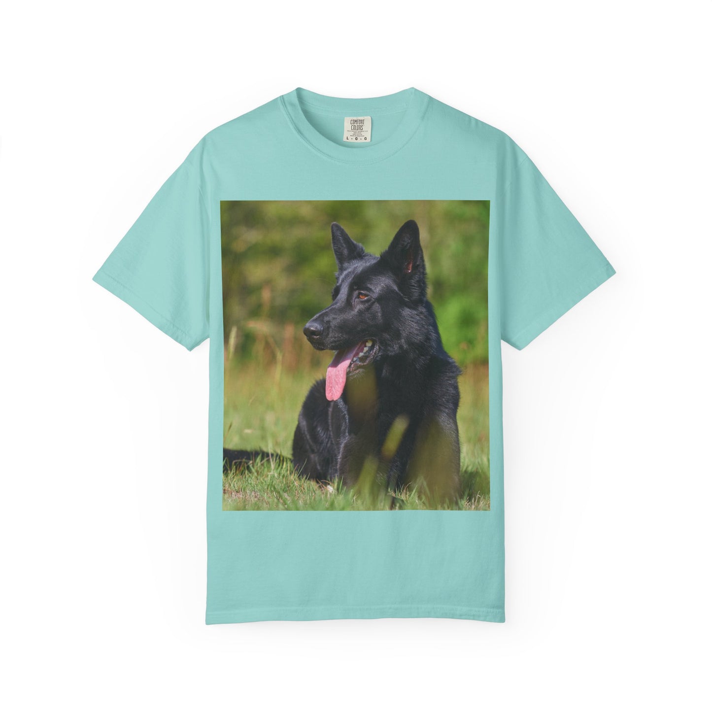 Unisex Garment-Dyed T-Shirt Featuring a Black German Shepherd Resting on Grass Looking Sideways