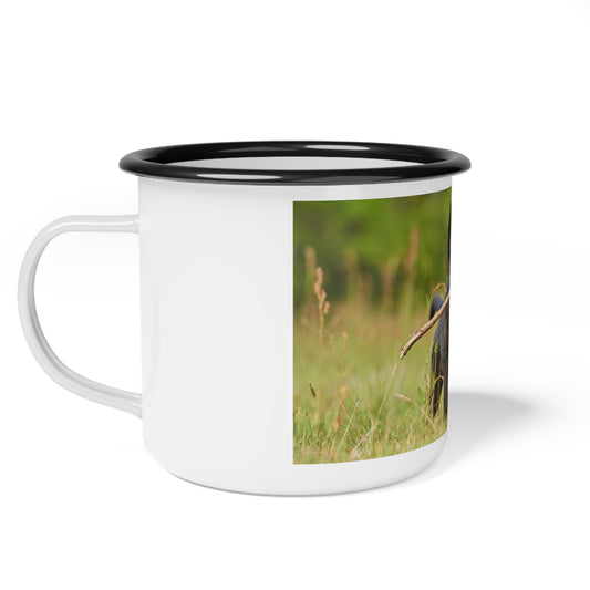 Nature-Inspired Enamel Camp Cup – Black German Shepherd Puppy Holding a Wood Piece In Mouth Running on the Grass