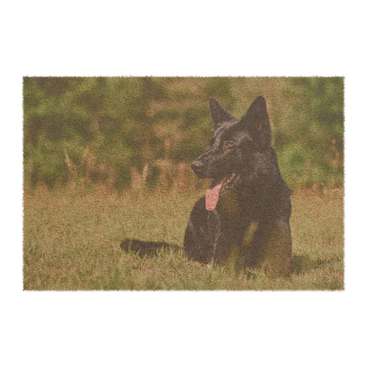 Dog Lovers Doormat Featuring a Solid Black German Shepherd Resting on the Grass With a Hanging Tongue