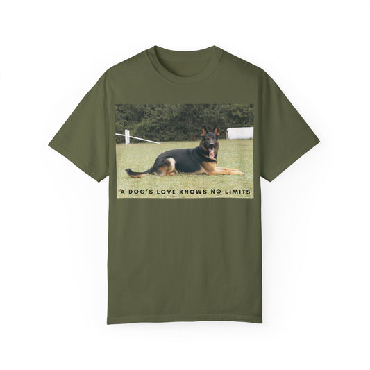 Unisex Dog Lover T-Shirt With a Giant German Shepherd Resting On the Grass Leaving Tongue Out and Text A Dog's Love Knows
