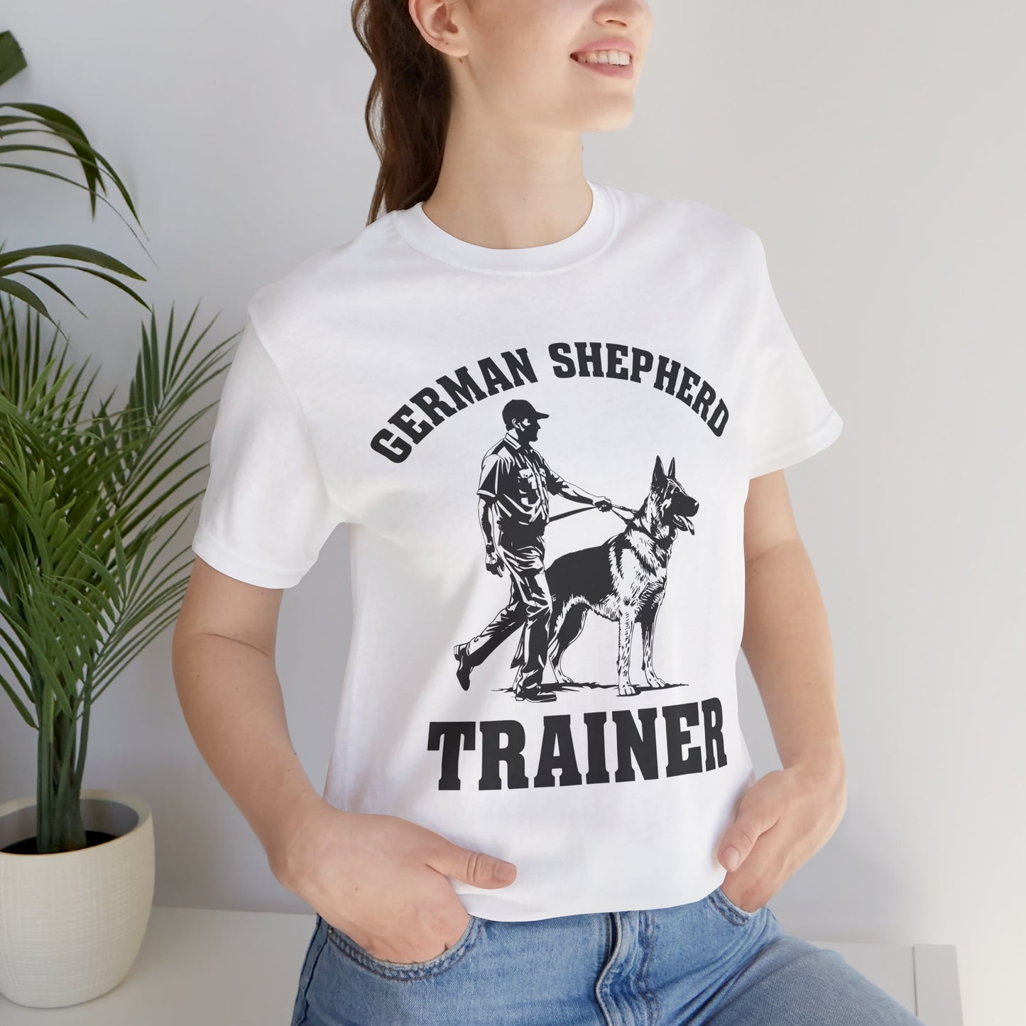German Shepherd Trainer Tee - Black and White Design of Man Holding a German Shepherd