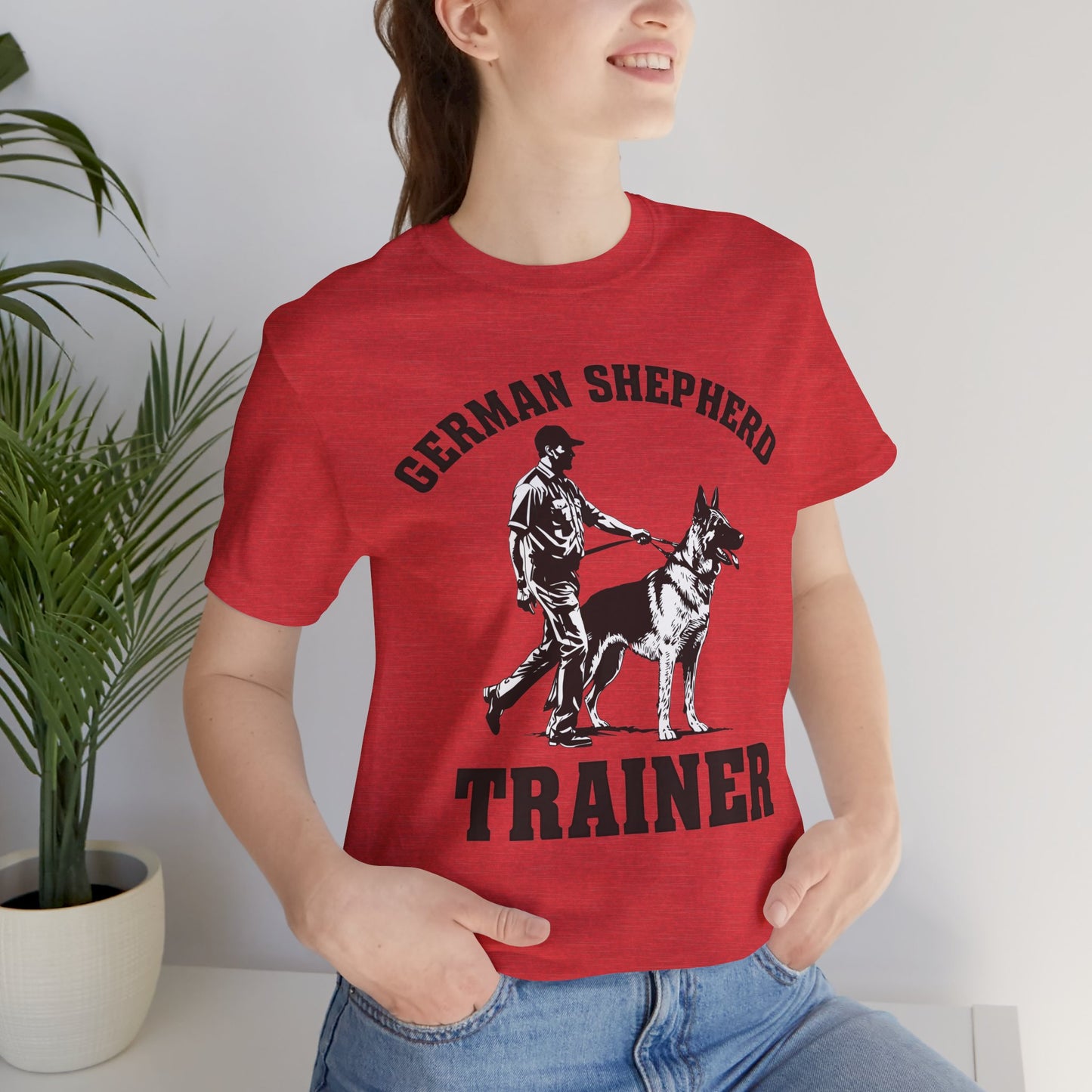 German Shepherd Trainer Tee - Black and White Design of Man Holding a German Shepherd