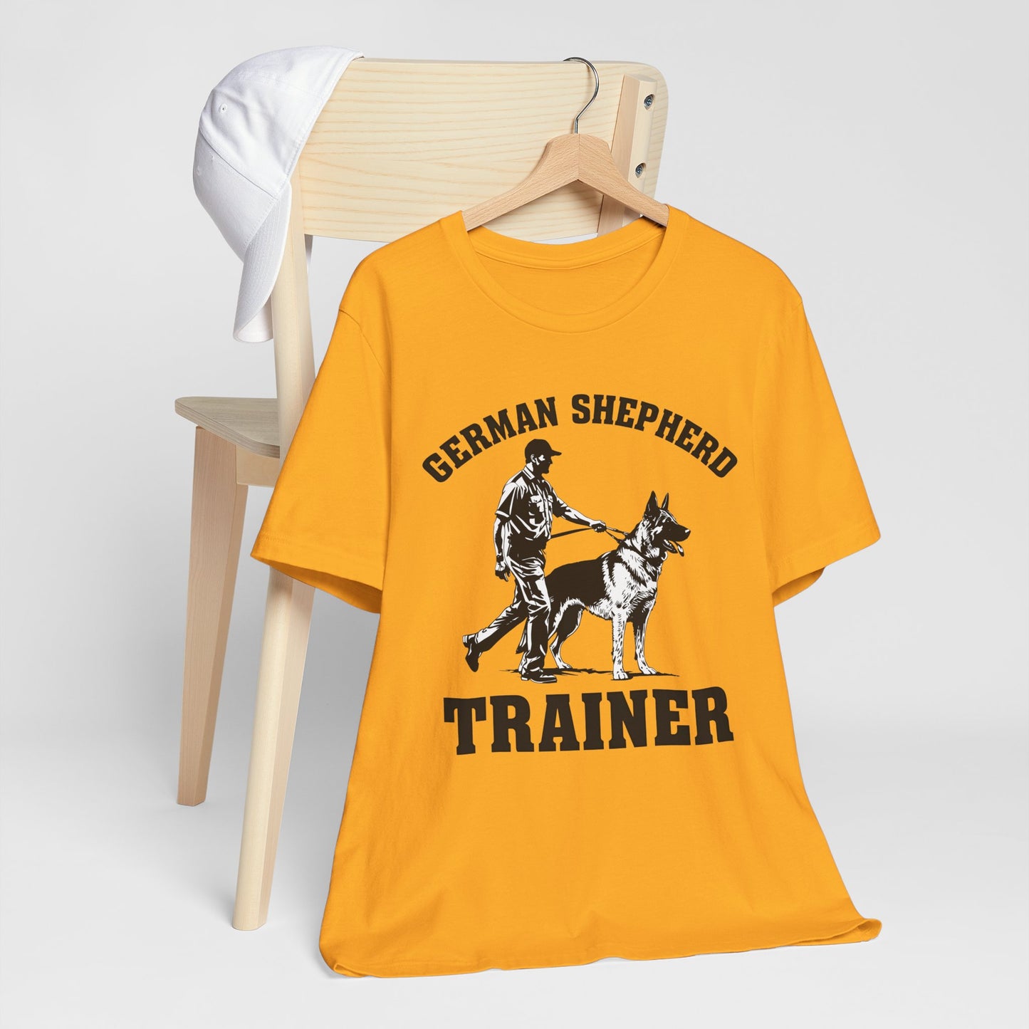 German Shepherd Trainer Tee - Black and White Design of Man Holding a German Shepherd