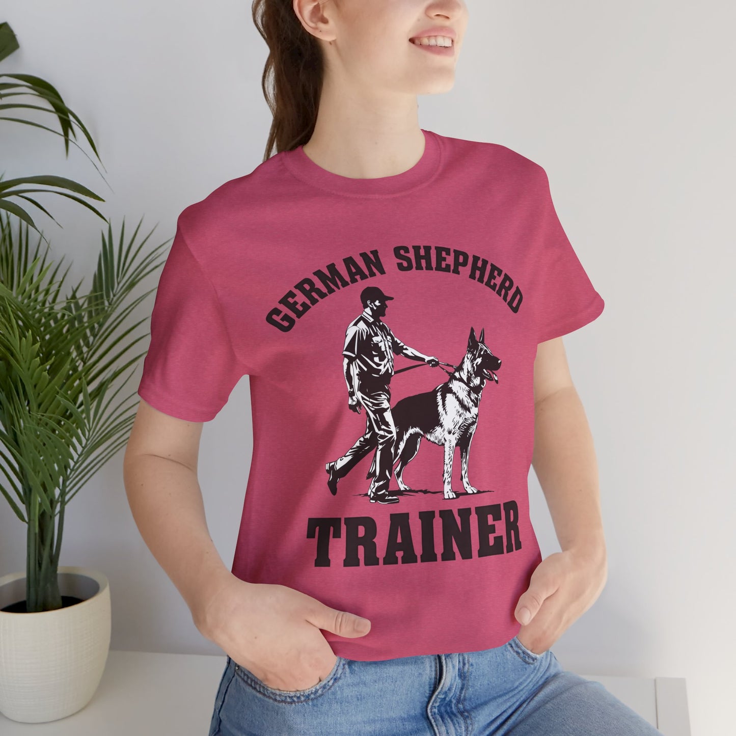 German Shepherd Trainer Tee - Black and White Design of Man Holding a German Shepherd