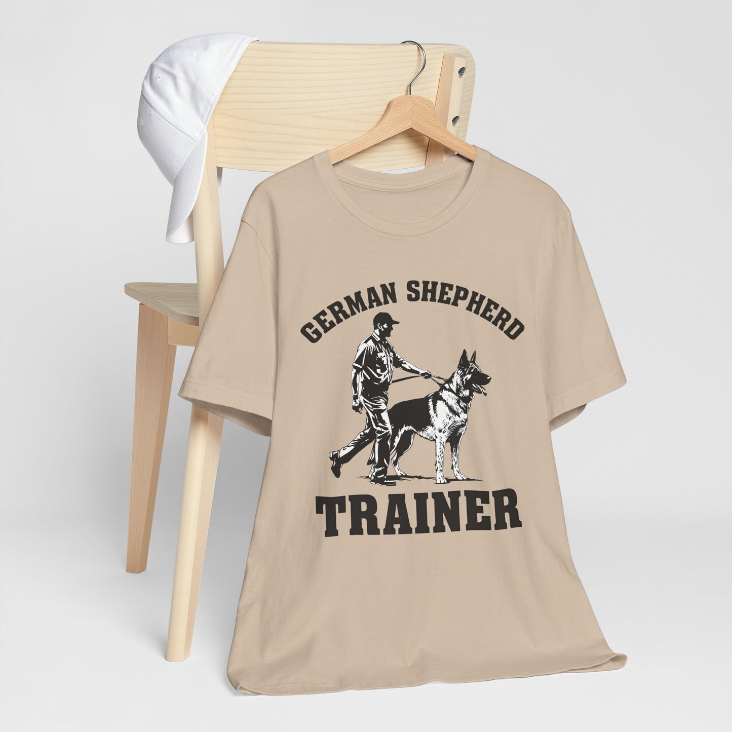 German Shepherd Trainer Tee - Black and White Design of Man Holding a German Shepherd