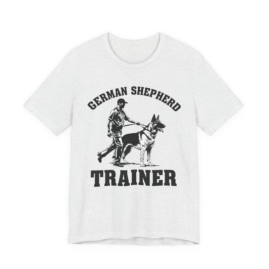 German Shepherd Trainer Tee - Black and White Design of Man Holding a German Shepherd