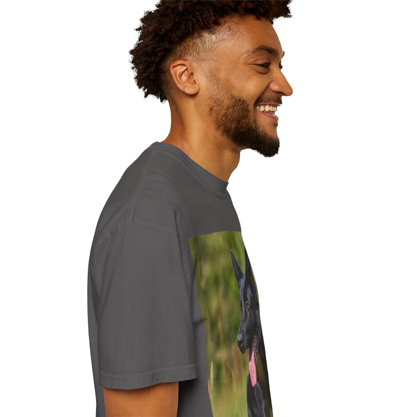 Unisex Garment-Dyed T-Shirt Featuring a Black German Shepherd Resting on Grass Looking Sideways